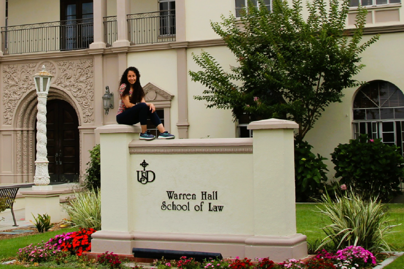 sheba candor sheba candor sitting on top of school of law plaque